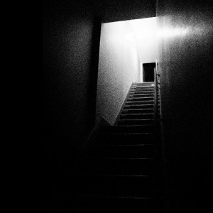 Dark basement stairs