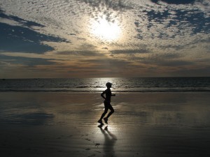 Woman running on the beach
